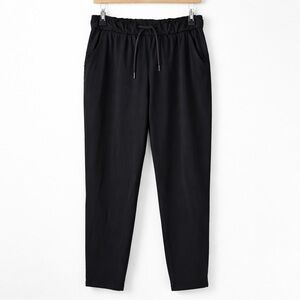 Lululemon On The Fly Pant Luxtreme Black Drawstring Travel Pant Size 6